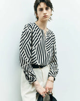 Blouse en soie à rayures géométriques